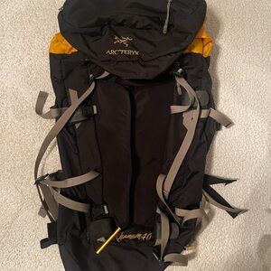 Arc'teryx Black and Dark Yellow Hiking Backpack with Durable Fabric